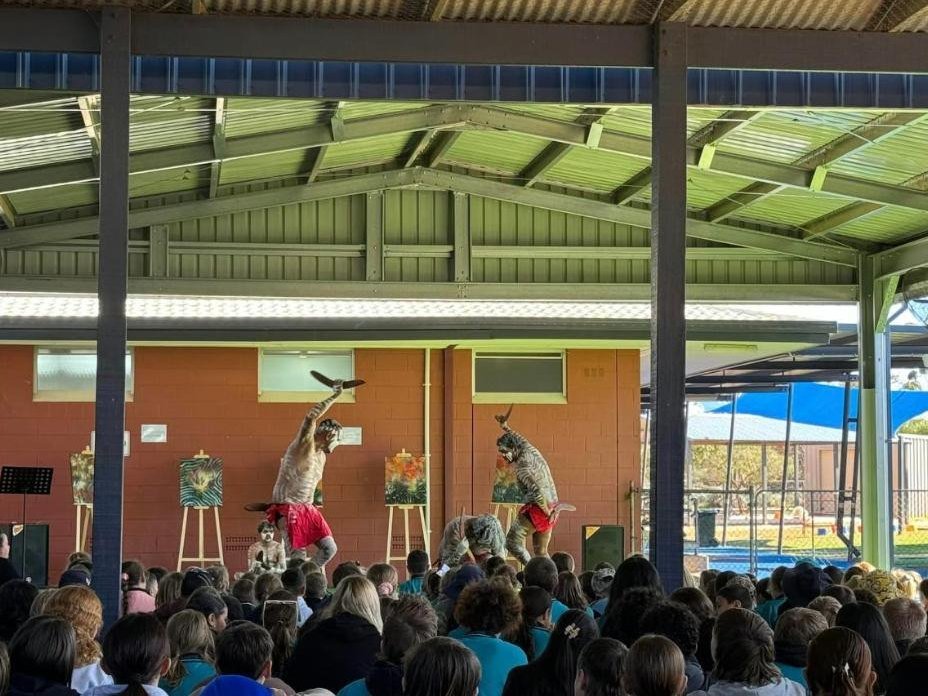 Dancers performing for a full school assembly